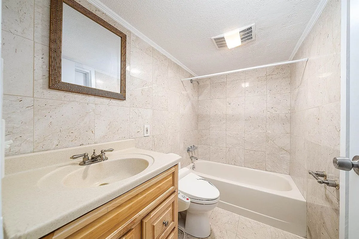 Full private bathroom inside the commercial condominium