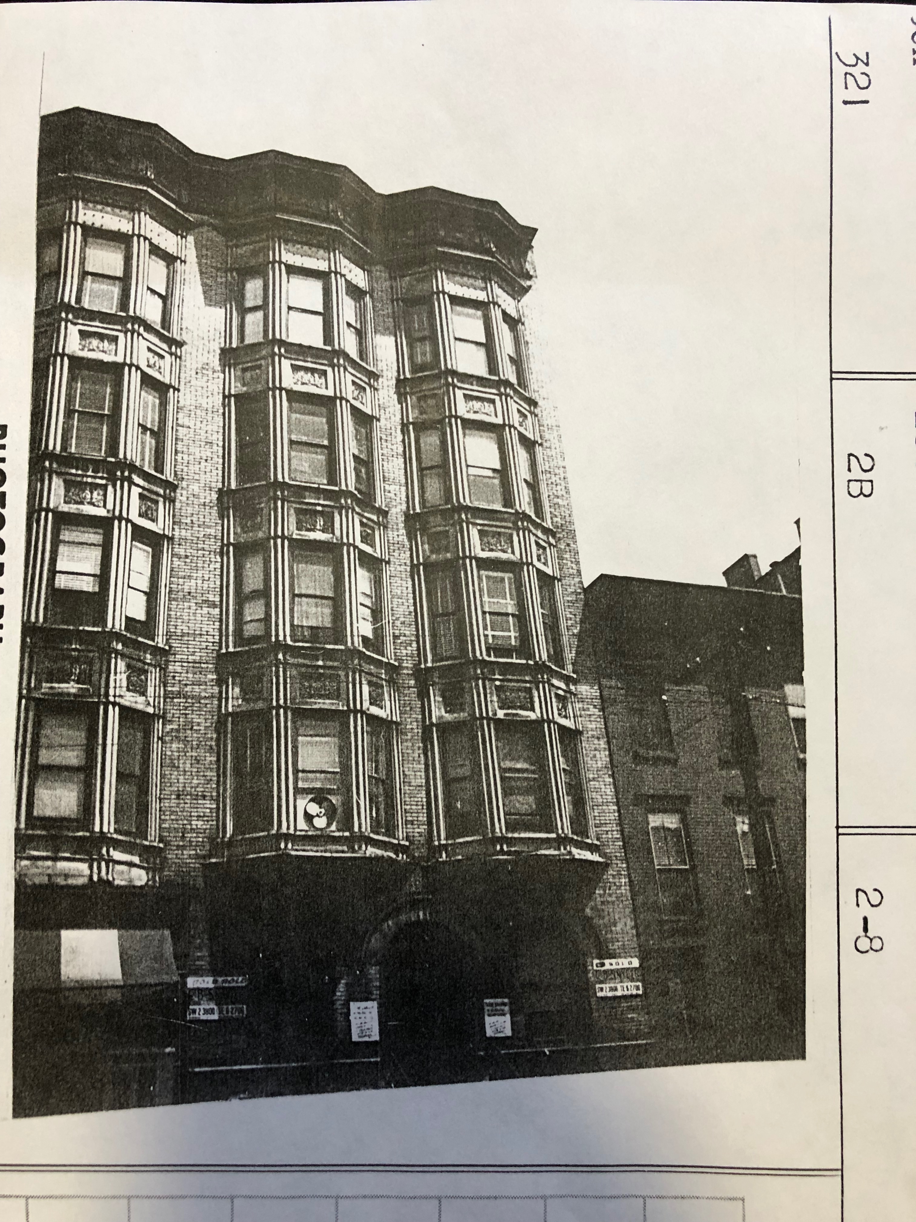 Archival tax photograph of the bay-fronted building at 168 Coles Street